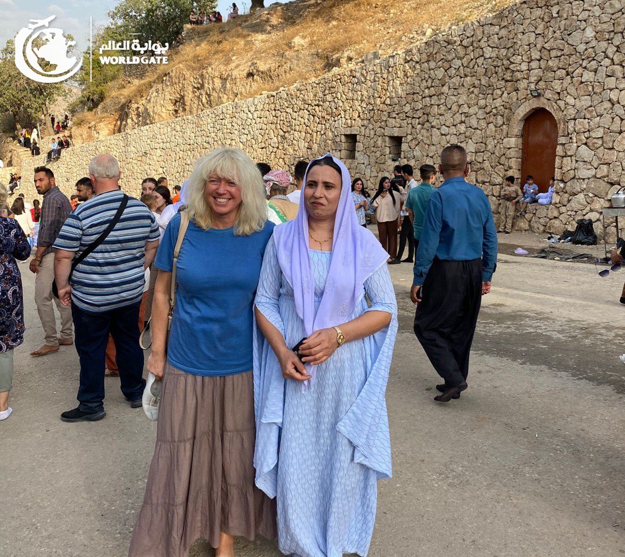 A traveller with a local woman at Lalish in Kurdistan